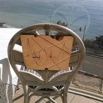 レストラン潮幸 - 穏やかな海を見ているMJの椅子