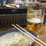 磯丸水産 - ポテサラ323円
            生ビール300円