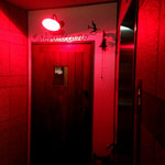 47935863 - 入口扉の真っ赤な照明