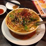 gyouzayaryuu - 担々麺 しっかり辛くて香ばしくうま味のあるスープです。