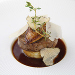 Layered grilled Wagyu beef fillet and foie gras with truffle sauce