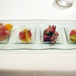 Taormina Sicilian Cuisine - 前菜４種の盛り合わせ　ハマクア産カクテルトマトとモッツァレッラのカプレーゼ　パルマ産生ハムとローカルパパイヤ　タコとイカのブラックオリーブマリネ　ハワイ近海マグロのカルパッチョ