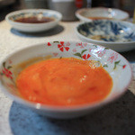 生ホルモン処 おさむちゃん。 - 鮮やかな山吹色した黄身が印象的な龍のたまご☆