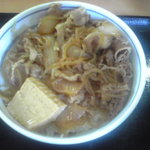 吉野家 - 2010/09/06　牛鍋丼280円、外の宣伝ポスターのようにキレイに盛って欲しいな。