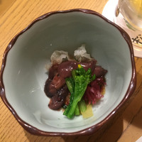 海鮮処松月亭 博多本店 - お通しのアップ   4月なので季節感あっていいです(ホタルイカ？と菜の花) 旬の食材を出されます。