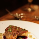 ポアジェ - お魚：鱸のポアレ　皮目が最高　タプナードソースで