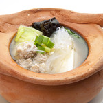 Light soup with tofu, vermicelli and pork dumplings