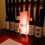 希少な田酒や十四代の瓶がごろごろ
