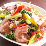 Salad with Prosciutto and seasonal vegetables, balsamic dressing