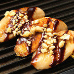 Grilled banana and cashew nut chocolate sauce