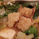 鳥勝 - 煮込み豆腐：プリップリのモツがたっぷり