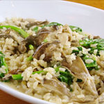 Cream risotto with porcini mushrooms and plenty of spinach