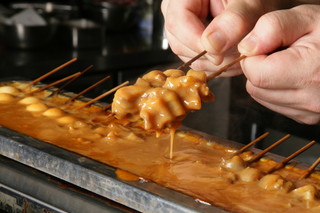 Kushikatsu Dengana - 当店イチオシ　どて焼き◆　牛のスジ肉を味噌やみりんで時間をかけて煮込みました