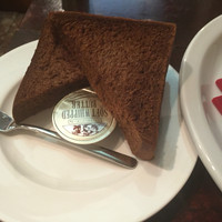 和牛熟成牛とシチリアワイン せいとう 本店 - 黒パン