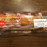 セブンイレブン - 料理写真:ベーコンピザスティックのパッケージ