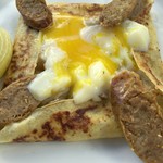 Arancino di Mare - イタリアンソーセージの半熟卵をカット