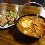 立ち酔い 超人 - 唐揚げ250円 チゲ豆腐300円