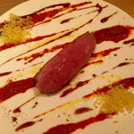 L’AS - ハンガリー産　仔鴨のロースト　ピペラードソース（パプリカ、トマトの煮込み）　クスクス添え