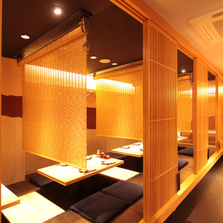 ``Semi-private room'' with sunken kotatsu seating for 8 to 12 people. *For reservations, please call