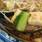 オグリ - 餡は辛さは抑え目で甘め。青菜も入ってます。