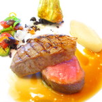 La Chevre d’Or - Milk-fed lamb,
      Grilled chop with black olive sauce.