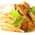 Les Remparts - Spaghetti pasta with grilled shrimps,tomato and basil.