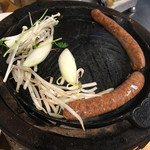 立ち食いジンギスカン はや川 - ラムソーセージ 1本300円