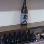 大分の海と山の料理 でんでん - 郷土の焼酎   麦焼酎ですが キリッとしてる中に独特の癖があり 力強い味です やっぱりロックがうまいなぁ