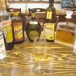 トラットリア ダ コヴィーノ - トスキ・ノチェロ（クルミのリキュール）　￥800