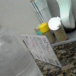 ラーメン力 - 卓上のｺﾞﾏとｺｼｮｳは無料。お冷は醤油のﾍﾟｯﾄﾎﾞﾄﾙでｗ