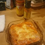 千匹屋 立ち飲み屋 - ソーセージチーズ焼、島ネロ投入