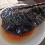 胡同文華 - 黒餃子は、スパイスを効かせた　牛肉が詰まっています