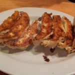 １皿目の餃子（７個150円・税込）