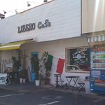 石窯ピザ&ダイニング LIBEROcafe - アンティークな外観とイタリア国旗が目印