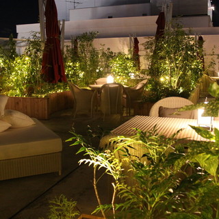 Open during the day, fantastic garden terrace seating at night