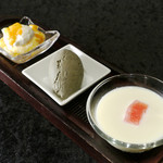 An assortment of three of our signature sweets: almond jelly, mango pudding, and black sesame Sweets cream