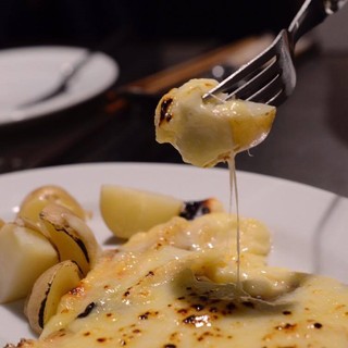 Enjoy authentic French cuisine with game, raclette cheese, and seasonal specialties