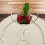 グリルグリーン - シェフからの一品。北海道トマトのマリネ シャンパンビネガー