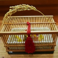 佳肴岡もと - 鈴虫の季節、虫籠を見立て稲穂がさしてあります。 