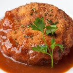 Juicy minced meat cutlet with demi-glace sauce