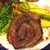 Enoteca 眞  - 料理写真:名物の北海道産仔羊から一品。仔羊バラ肉のロースト。臭みも全くなくホントに美味しい〜。
          煮込みのような柔らかなお肉が絶句の旨さでした。。。