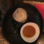 ネパール料理バルピパル - ランチ用のモモ。がっついて２つ食べてしまった後の姿