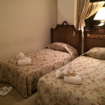 オーベルジュ・オー・ミラドー - ジュニアスイートの寝室