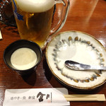 串焼き・魚 新宿宮川 - 生ビールとお通しです