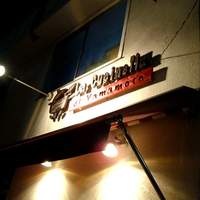 ラ・クチネッラ・ディ・ヤマモト - お店の看板