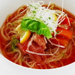 焼肉ダイニング GYUBEI - トマト冷麺 トマトを加えてサラダ感覚にあっさりと仕上げた冷麺です。女性に人気のヘルシーな冷麺です。