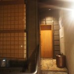 お料理 佐藤 - お店外観と言っても正面の扉はトイレですが入口は左にあります