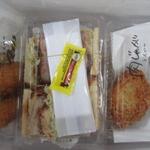 とんかつ マンジェ - テイクアウトいろいろ。一番左にカニクリームコロッケ H28.11再訪