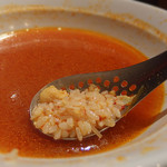 Karabaru - 辛麺のスープにご飯を入れて…
