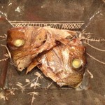 京ごちそう いしまる - お通しの鯛のかぶと焼き。